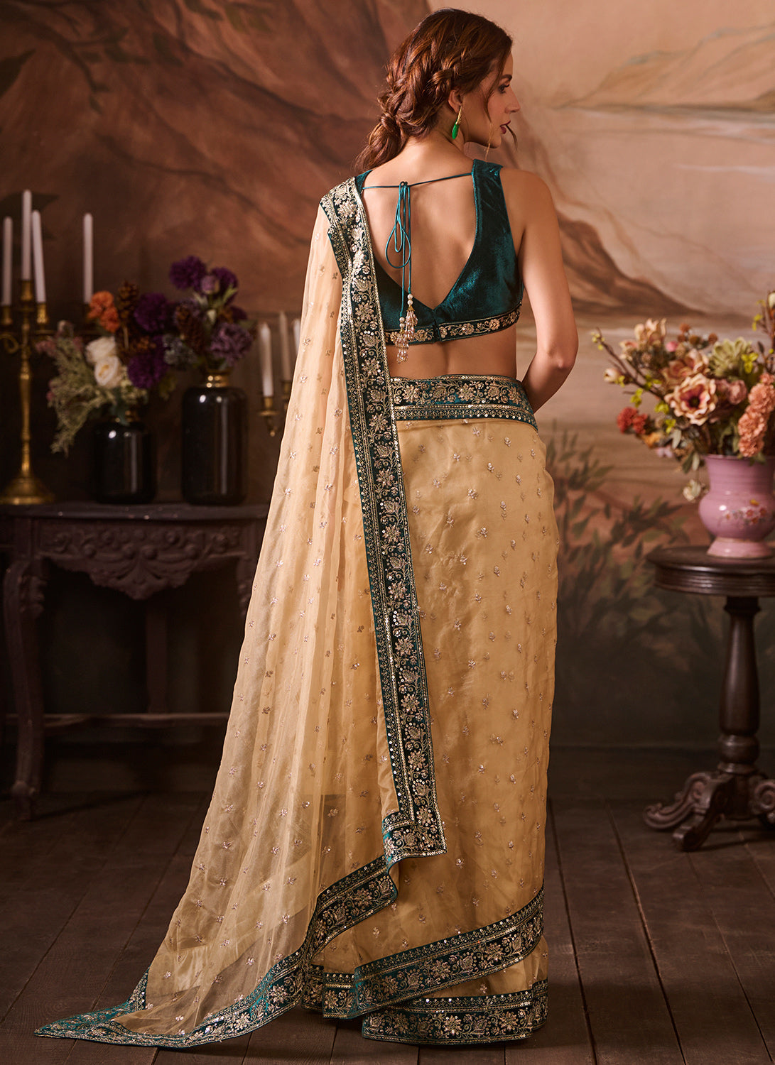 Beige and Blue Embroidered Velvet Saree