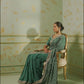 Teal Embroidered Georgette Saree