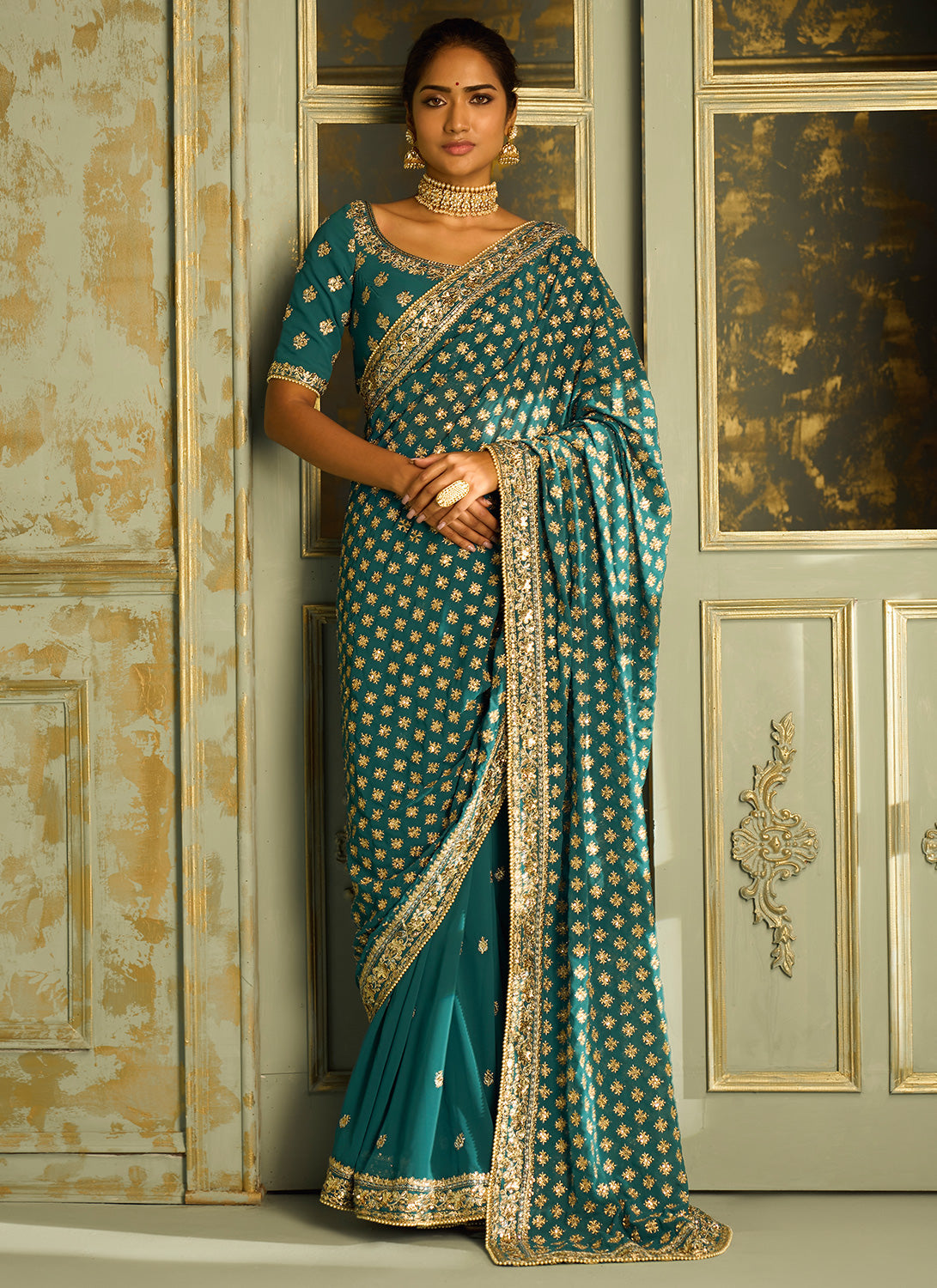 Teal Embroidered Georgette Saree – Lashkaraa India